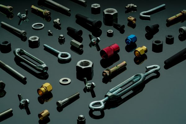 Metal bolts, nuts, and washers. Fasteners equipment. Hardware tools. Different types of nuts,